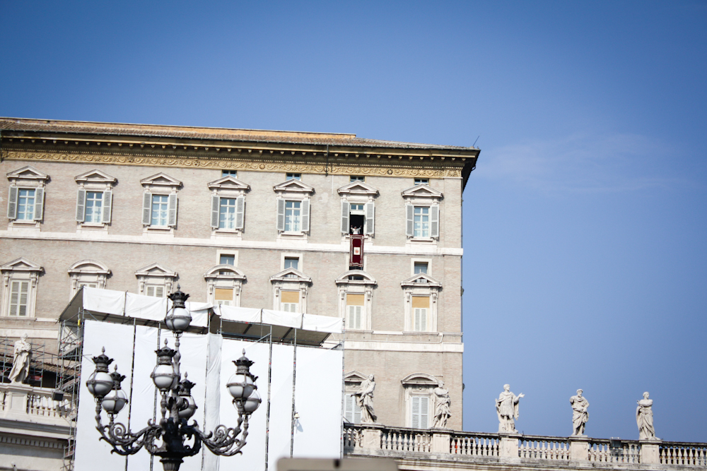 The Pope cleaning the papal carpet on a sunny sunday. Vatican, 2013